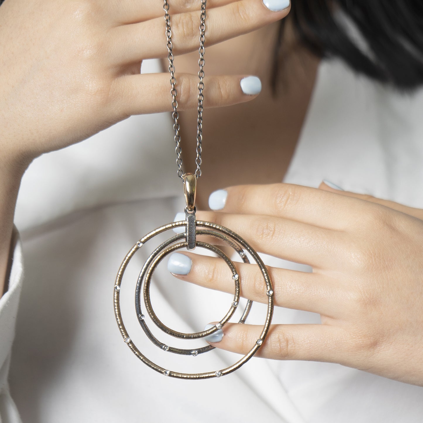 Collana a cerchi alternati in argento e bronzo. Collezione Egizia - D. De Maria